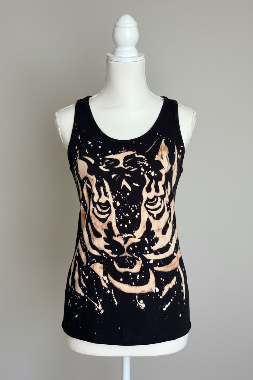 Black tank top with a tiger design on a mannequin against a gray background