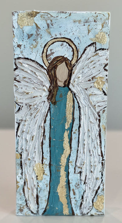 Decorative tile with an angel design on a light gray background

